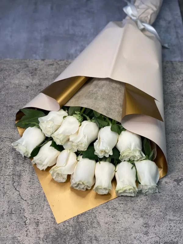 Dozen white roses